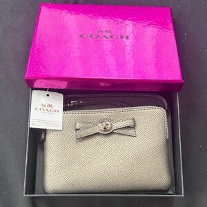 Coach Silver Wristlet with Bow Accent